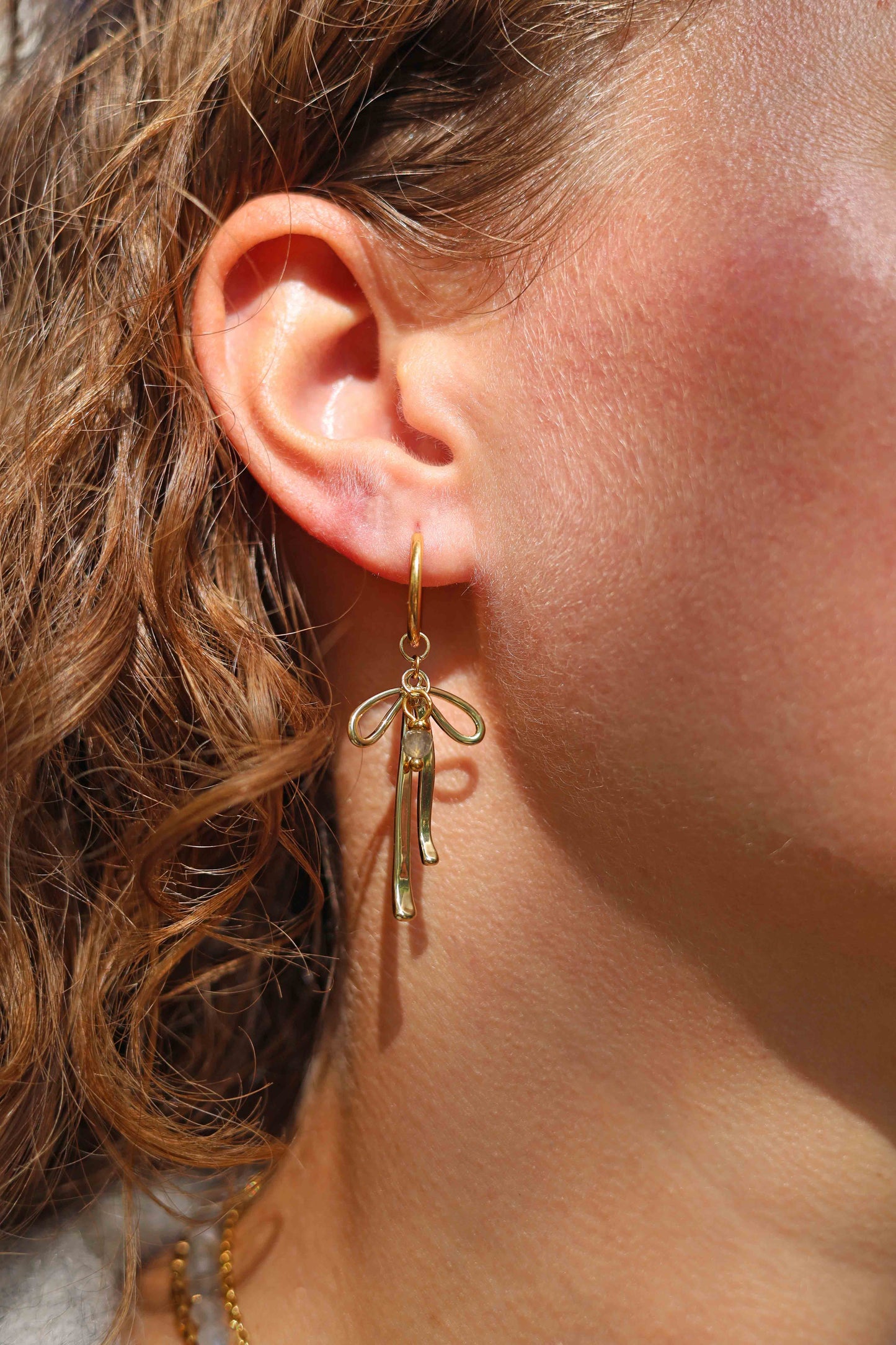 Oorbel Bow (4mm facet)