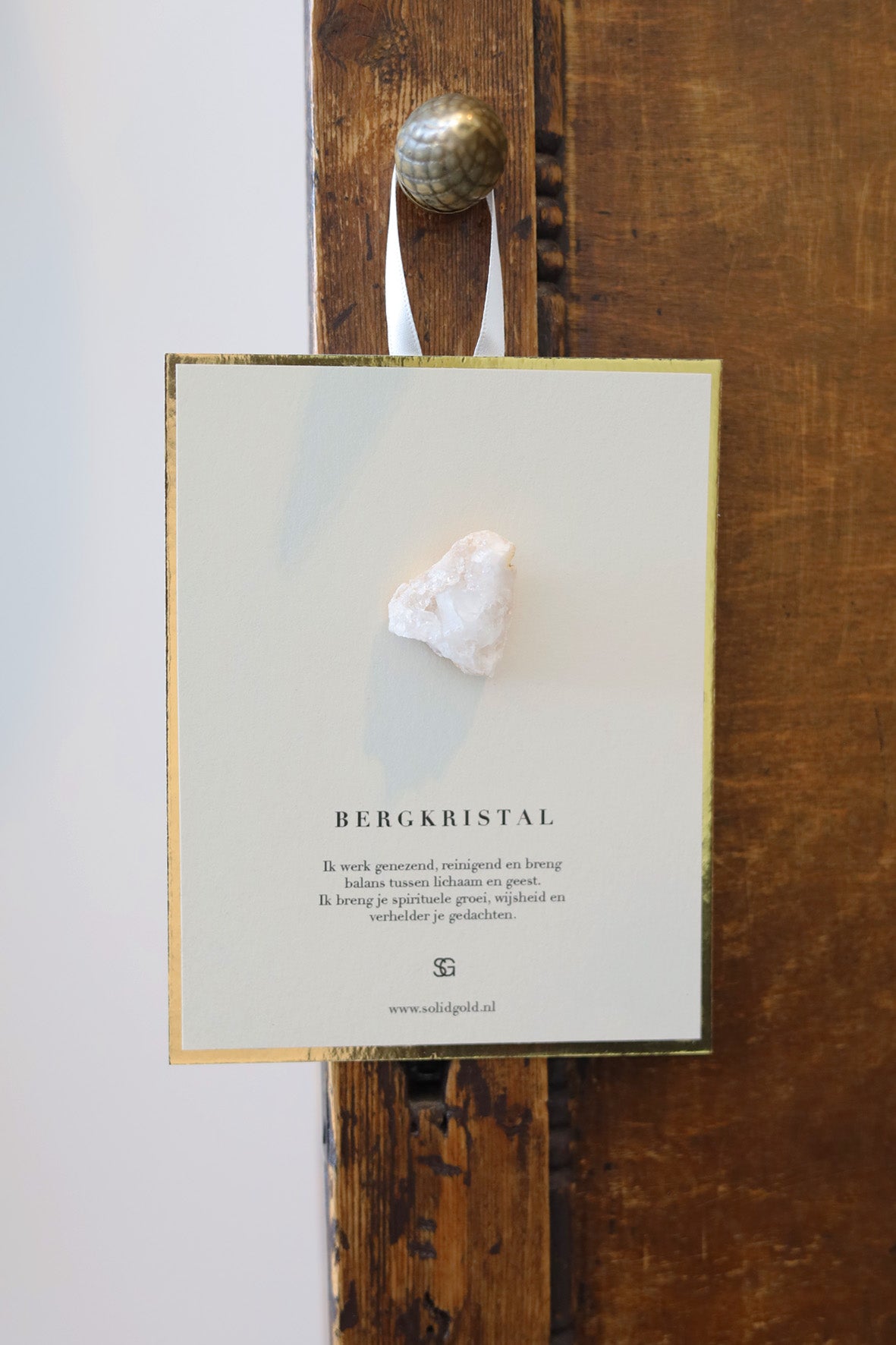 Card with gemstone - rock crystal